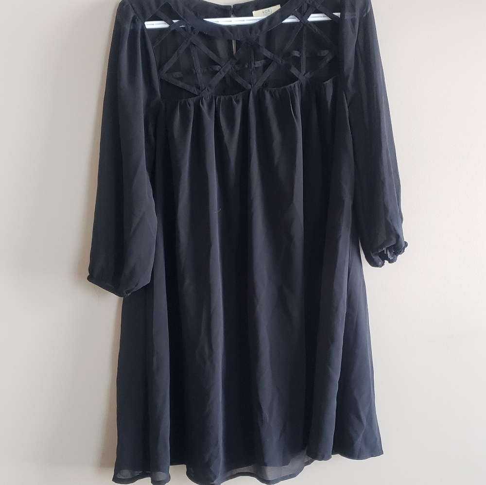 Black slip dress with criss cross open front